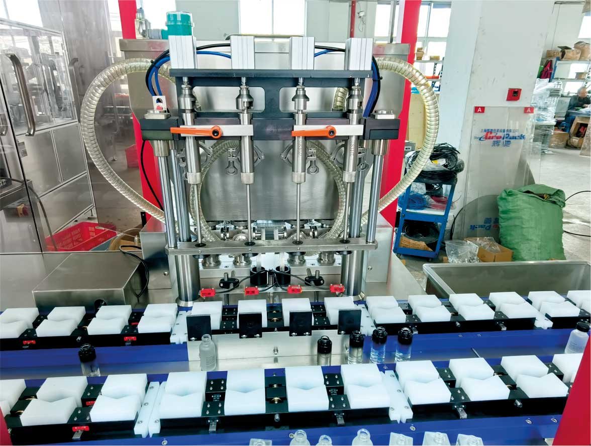 Automatic four-head liquid &cream cycle filling line - Image 2